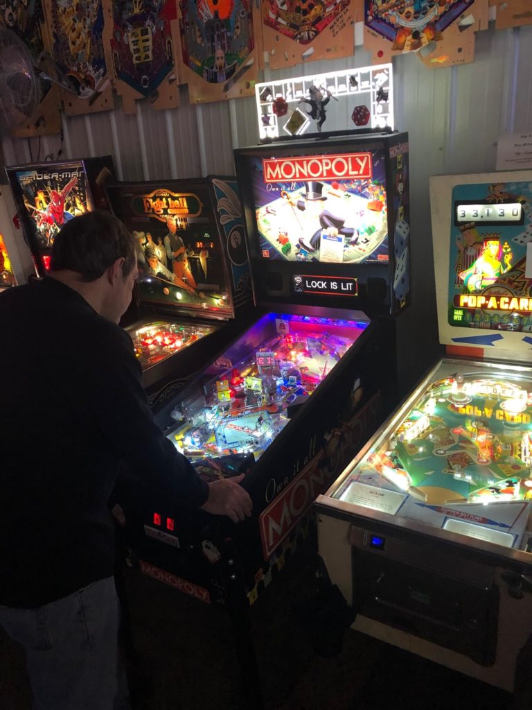 Playing Monopoly Pinball Machine in Green Bay, WI